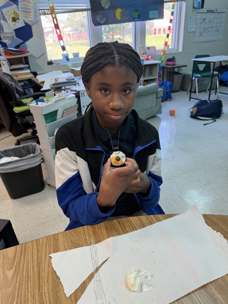 student shows snack