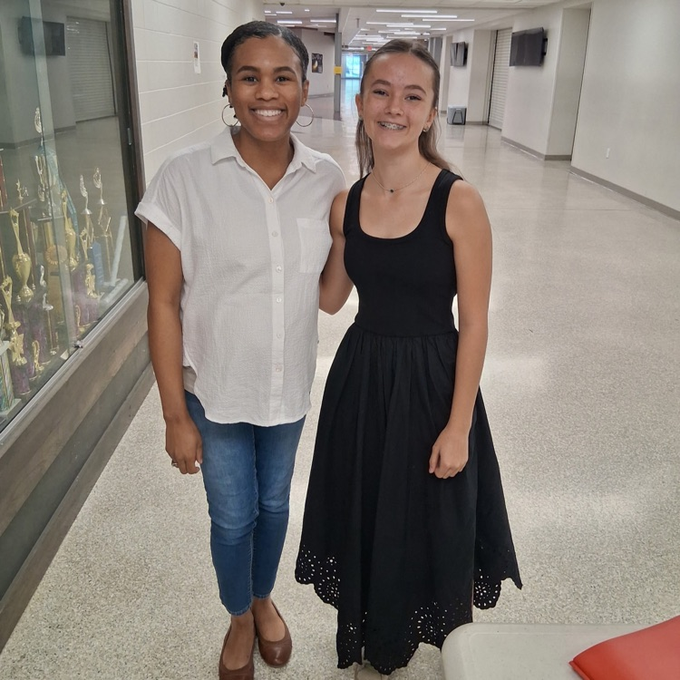 Ms. Anthony stands with Mae