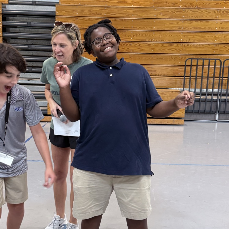 student smiling, and laughing