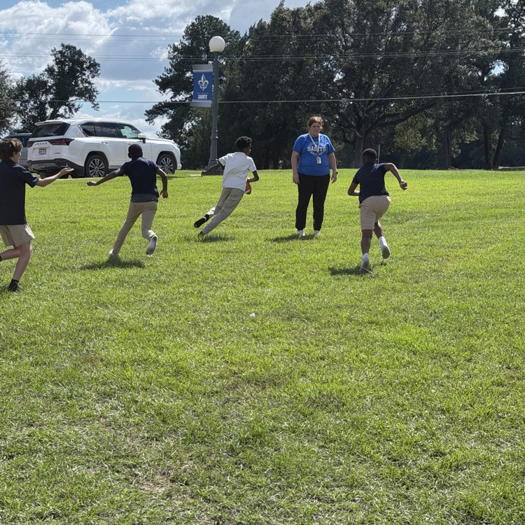 Students play a game of chase