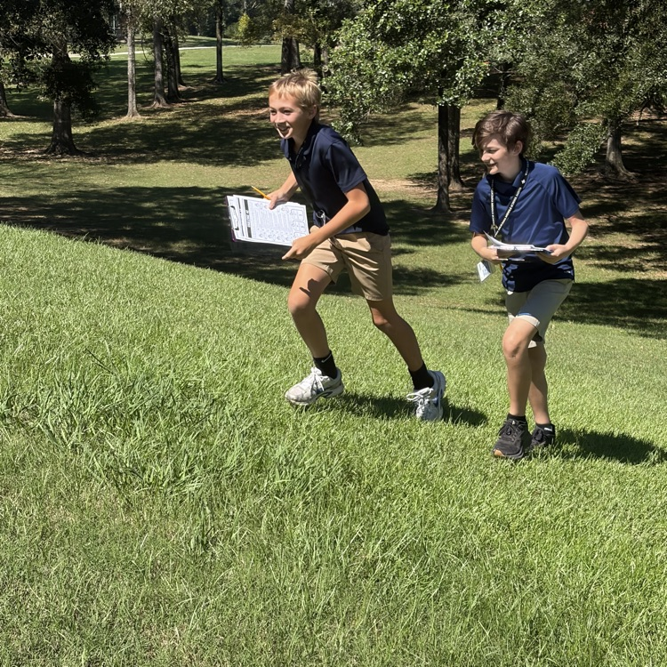 students actively engaged in outdoor learning