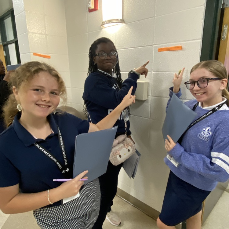 Students collaborate to solve a puzzle