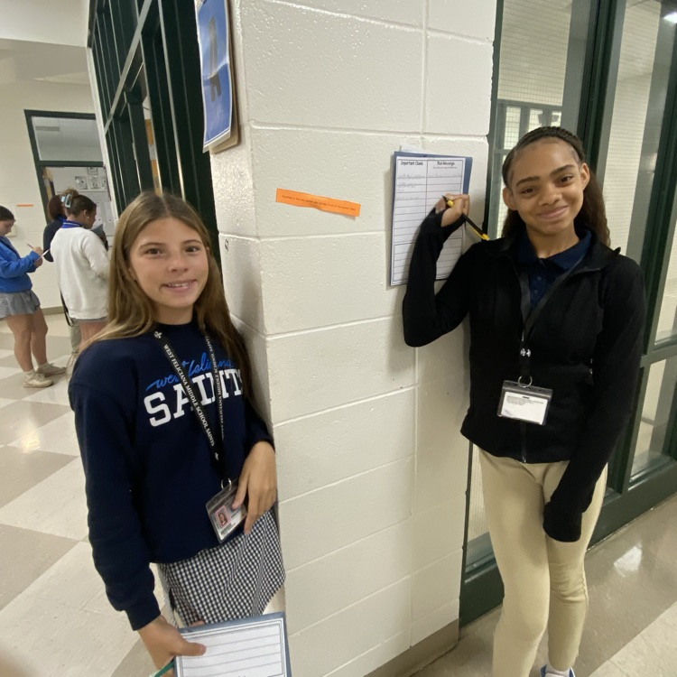 Students collaborate to solve a puzzle