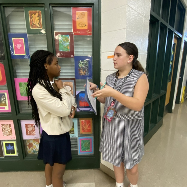 Students collaborate to solve a puzzle