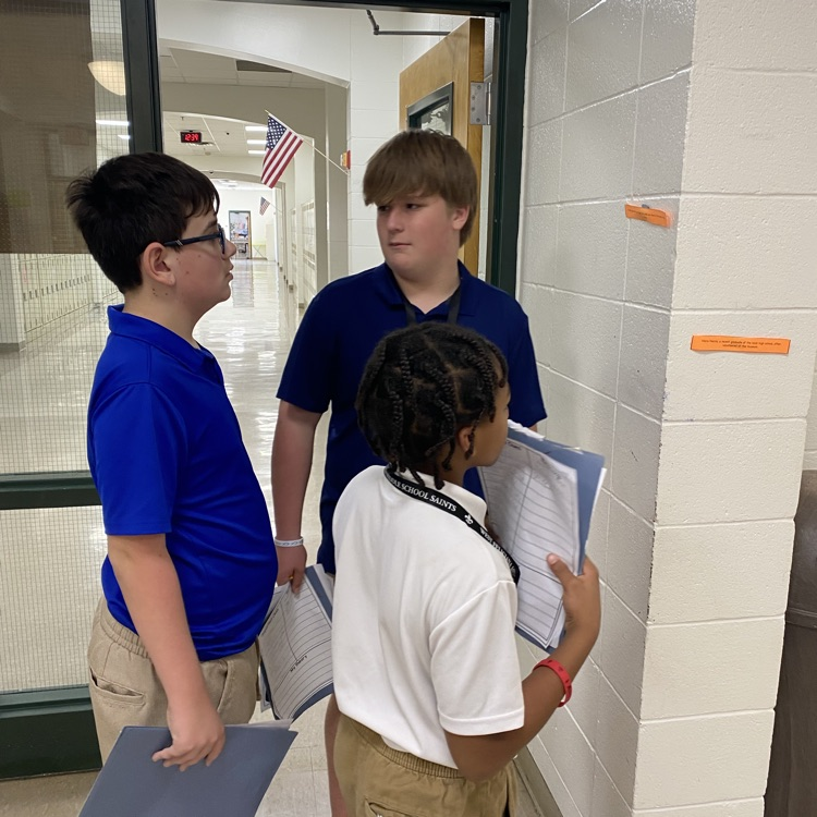 Students collaborate to solve a puzzle