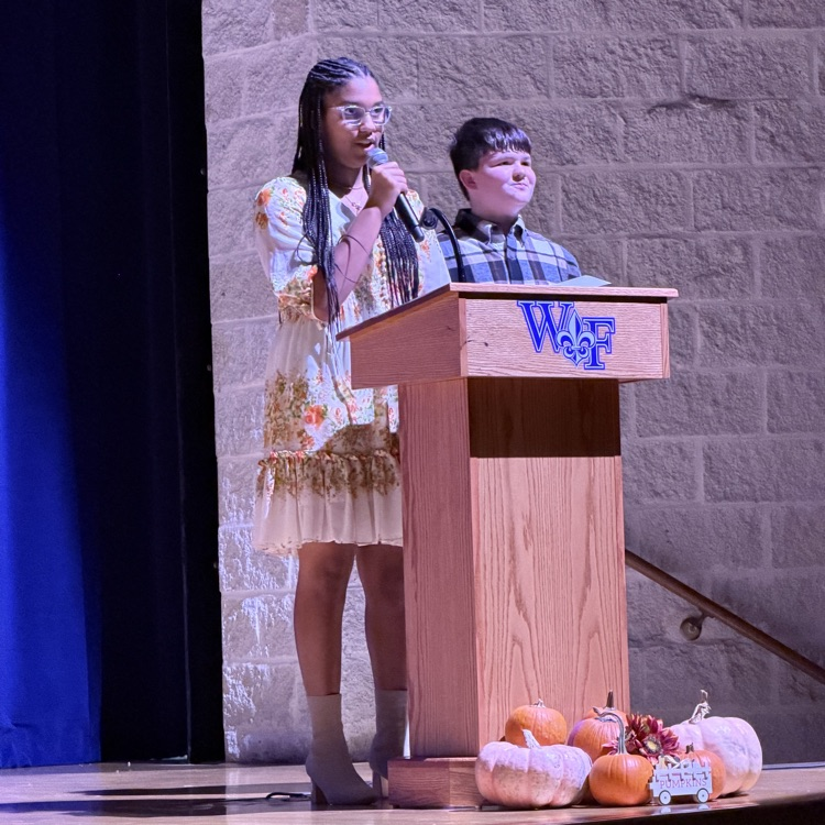 Students at podium