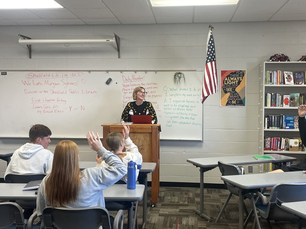 Librarian speaking to students.