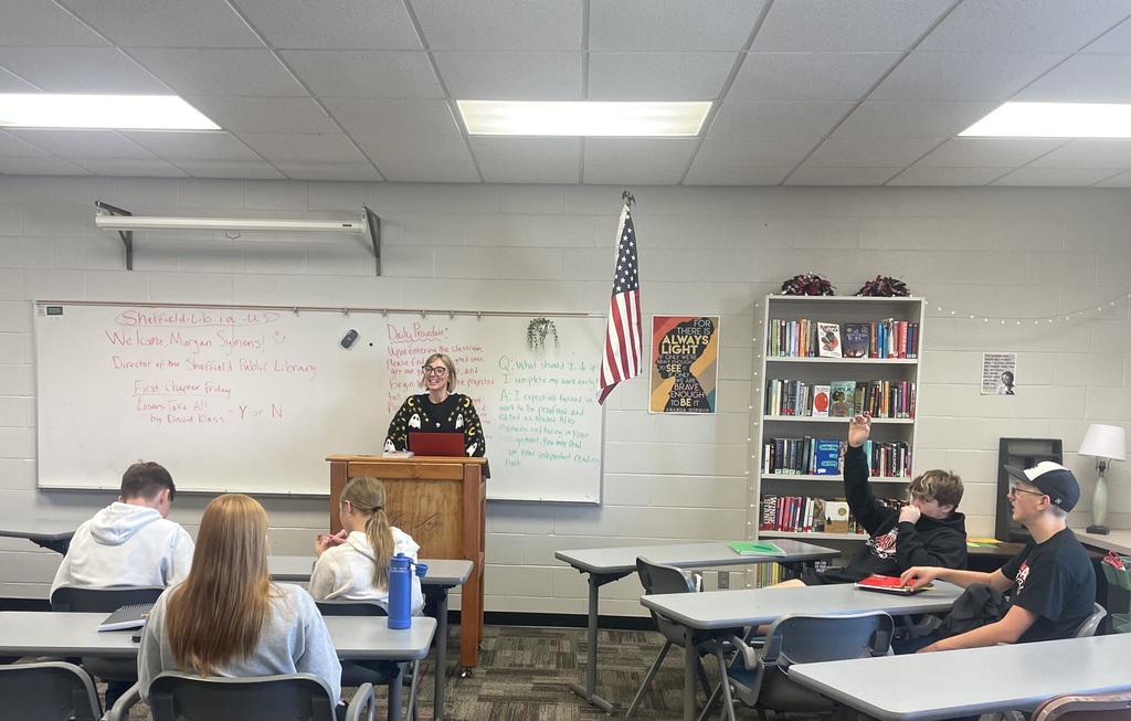 Librarian speaking to students.