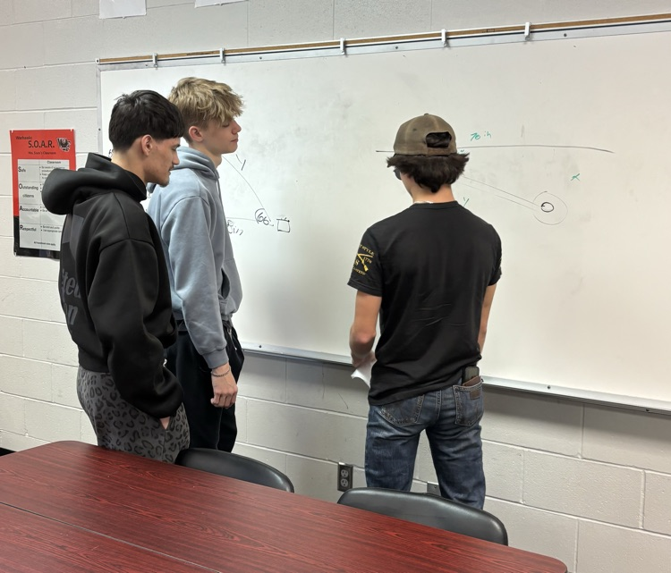 Students teaching Trigonometry. 