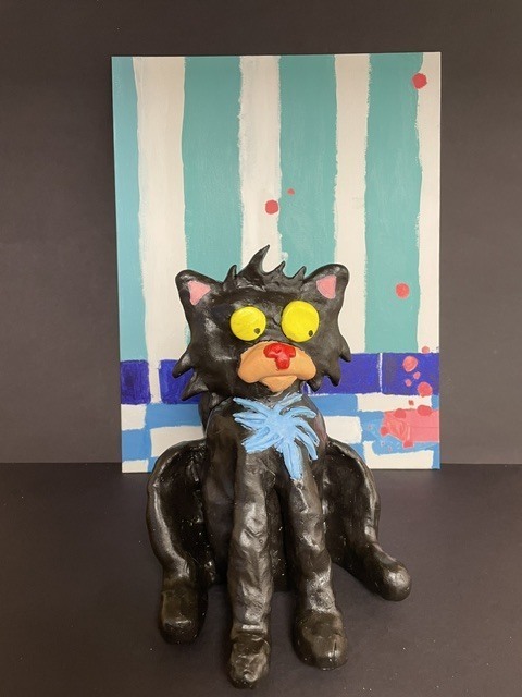Black cat clay sculpture