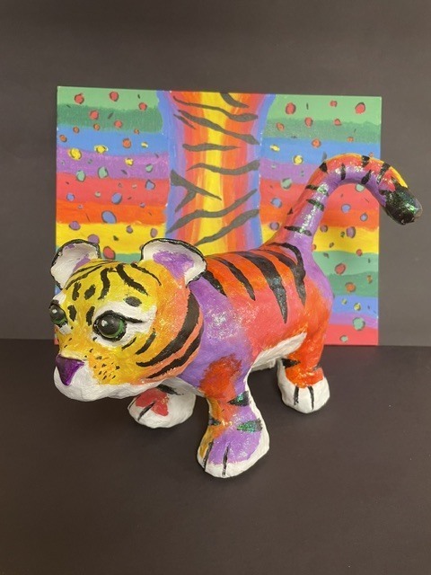 Clay sculpture of a colorful tiger