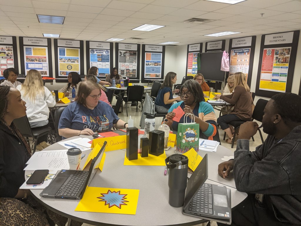 Teachers working together at Might Morphemes training.