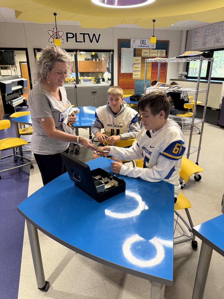 Students selling shirts