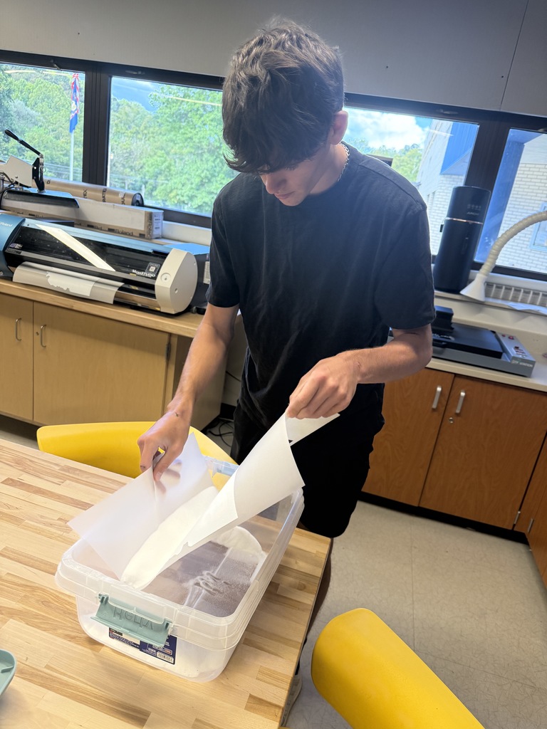 Student preparing shirt