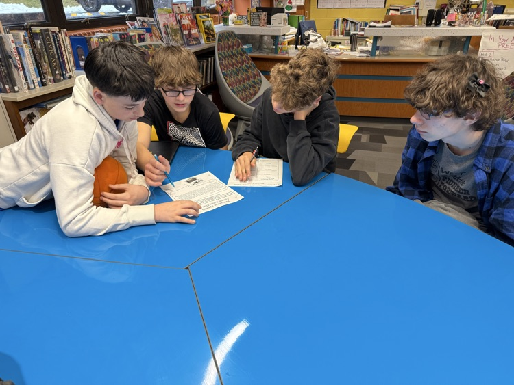 Four students working together 