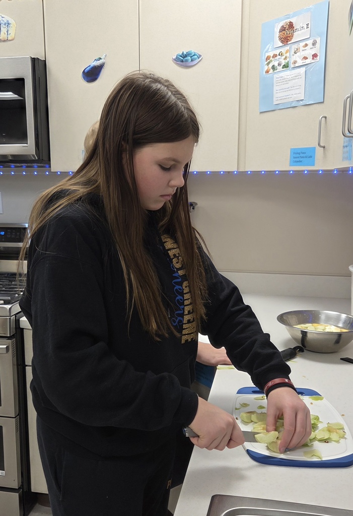 Prepping apples for pie filling.