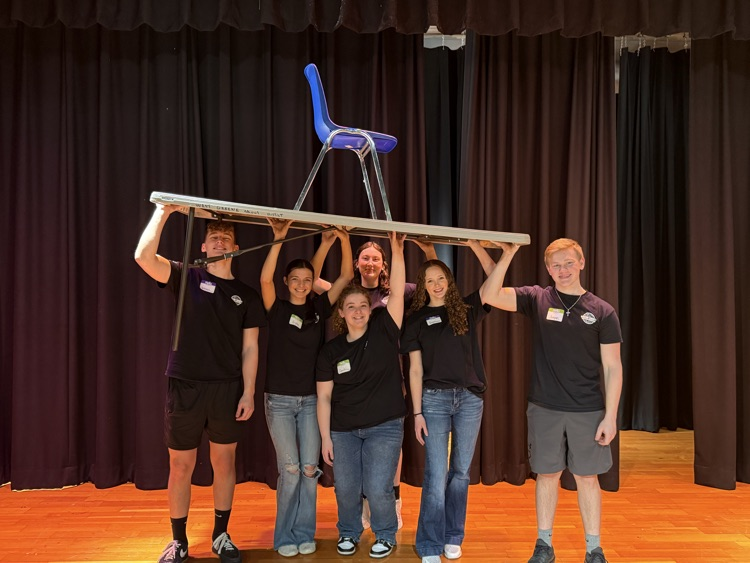 Science Club Members Helping