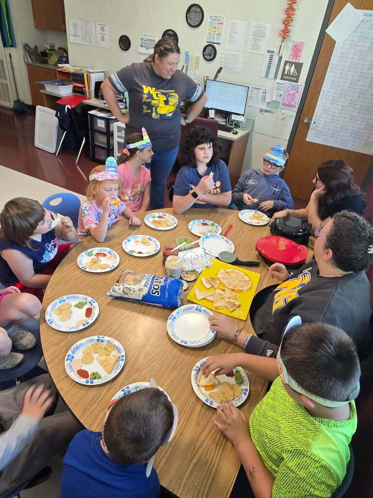 Student in Mrs. Rohrer's class enjoy eating quesadillas on National Quesadilla Day!