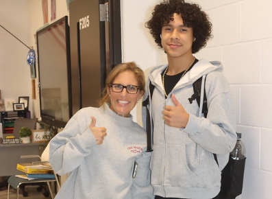 students and staff wearing gray