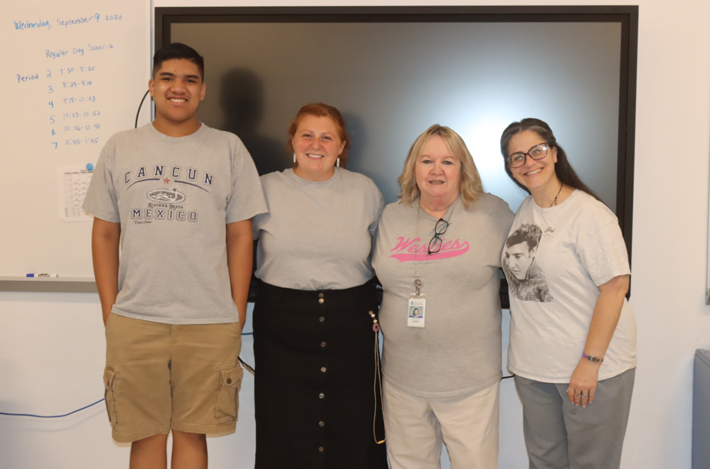 students and staff wearing gray