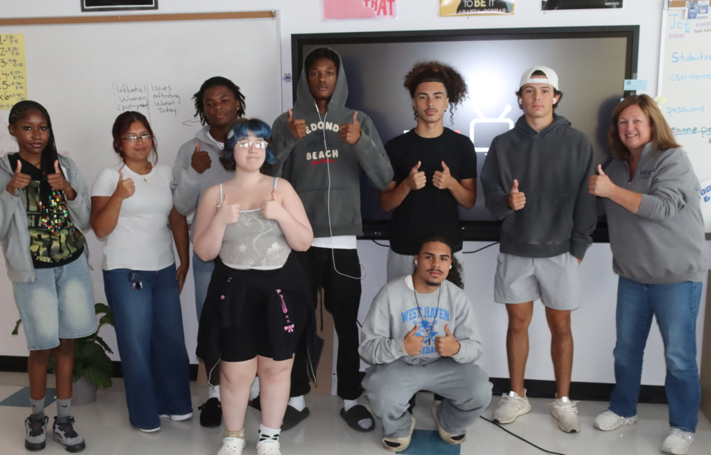 students and staff wearing gray