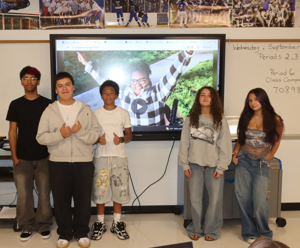 students and staff wearing gray