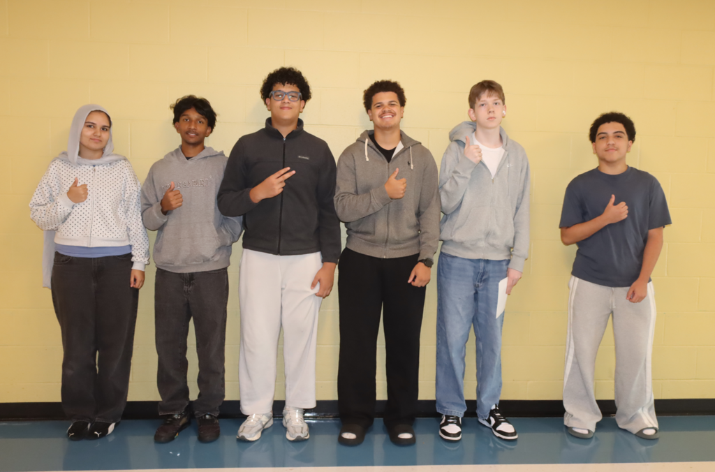 students and staff wearing gray
