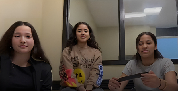 West Hempstead Secondary School’s Broadcasting students Victoria Covino, left, Jackie Perez and Kianna Maldonado received an honorable mention in the 2025 NPR Podcast Challenge.