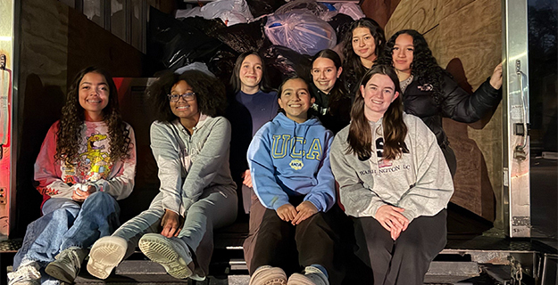 West Hempstead’s varsity cheerleaders lead a successful clothing drive 