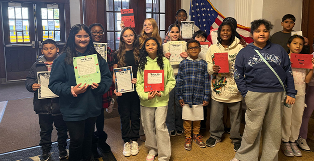  Members of the George Washington School Student Council collected handmade Veterans Day cards created by students to honor local veterans in the West Hempstead community.    