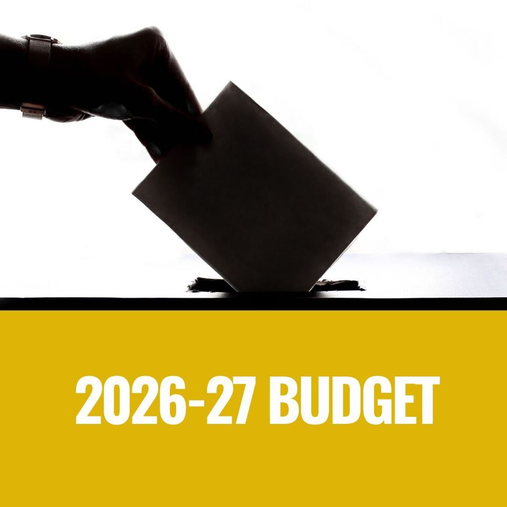 Photo of envelope being placed into a mailbox with text below that reads, "2026-27 budget."