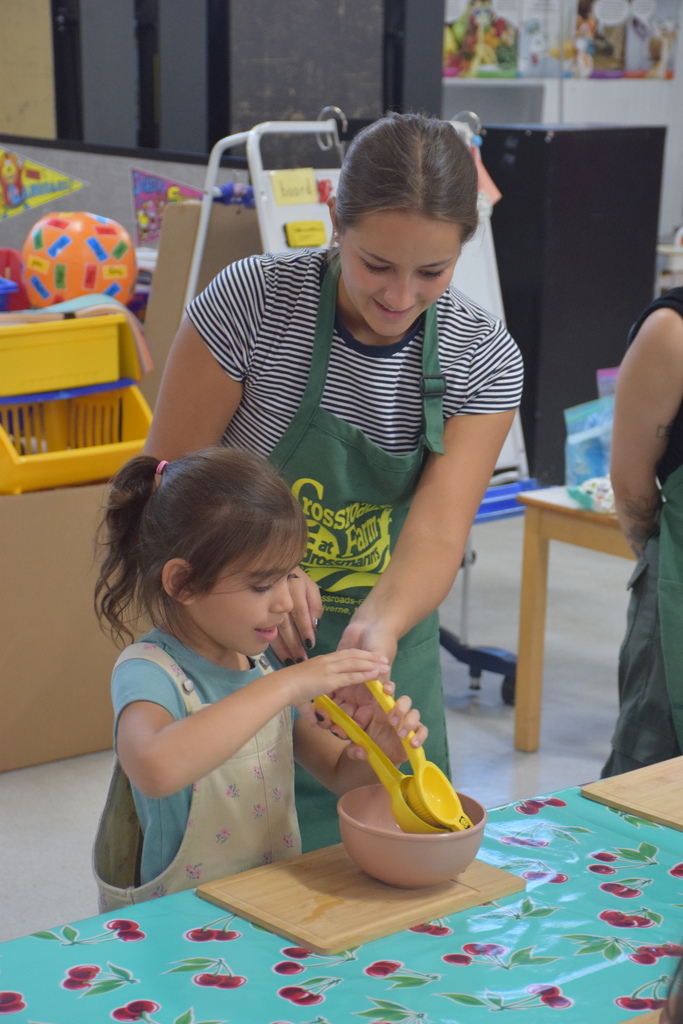 Photo of students squeezing lemonade.