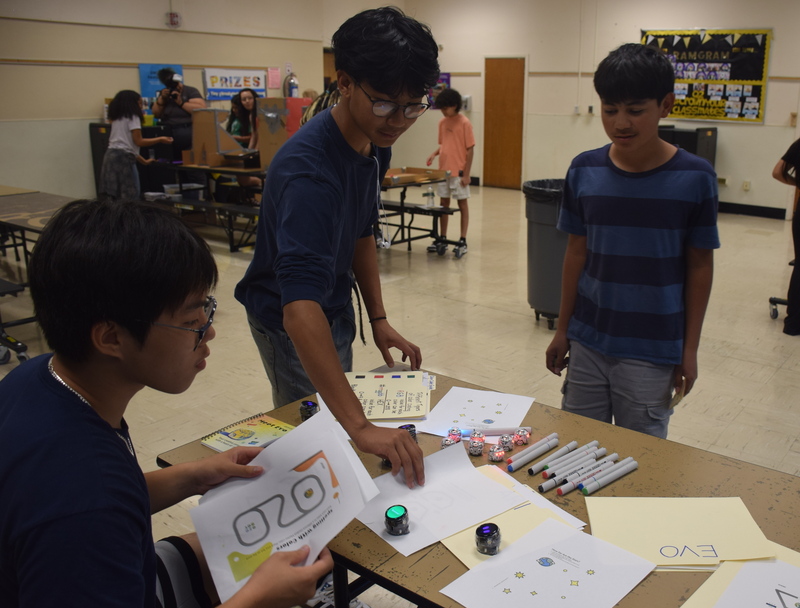 students collaborating in a classroom science experiment