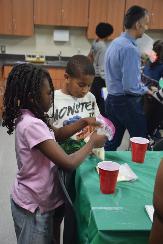 students participating in STEAM Night activity