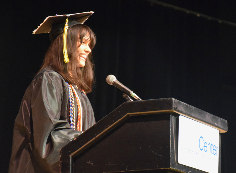 person speaks at podium