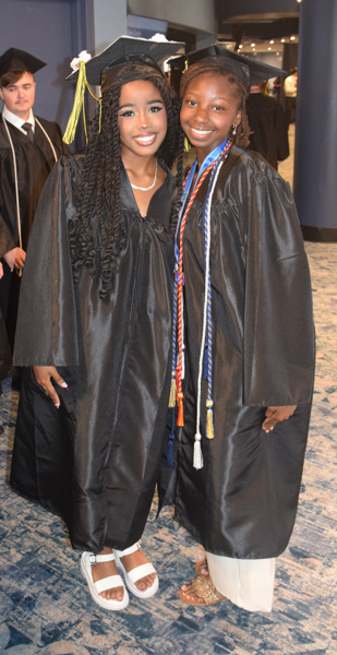 graduates in black caps and gowns