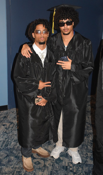 graduates in black caps and gowns