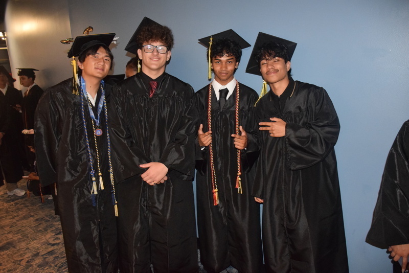 graduates in black caps and gowns