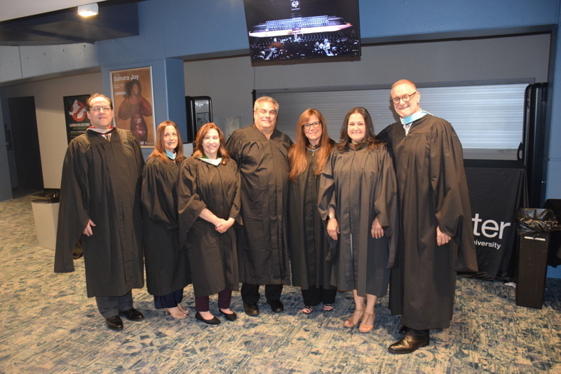 graduates in black caps and gowns