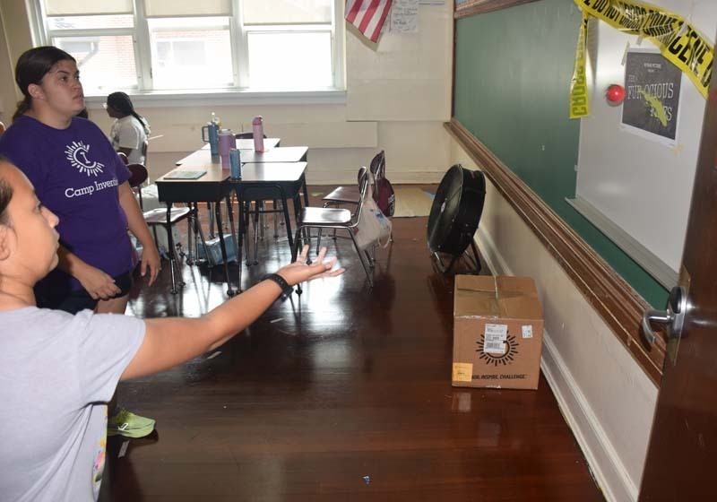 : Students also teamed up to craft sailboats.