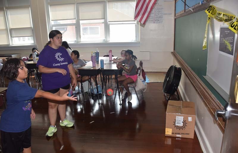 : Students also teamed up to craft sailboats.