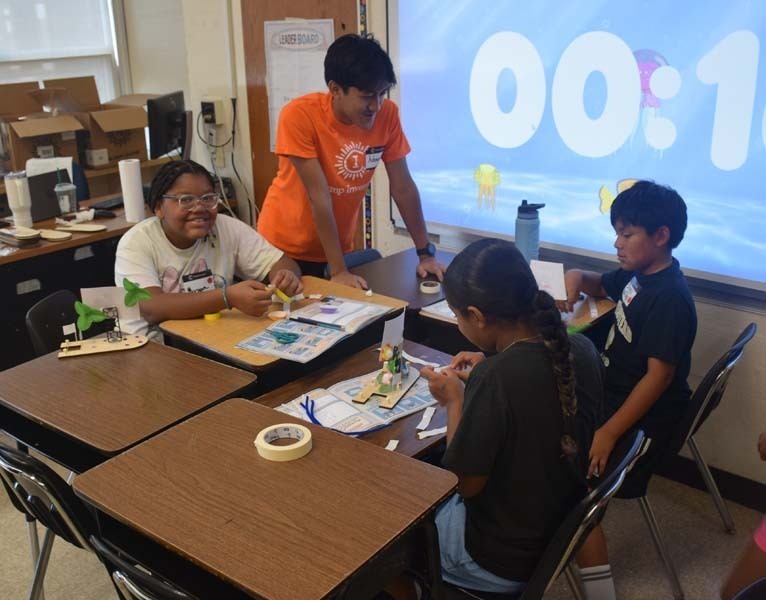 : Students also teamed up to craft sailboats.