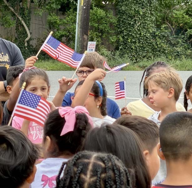 Students standing outside of school.