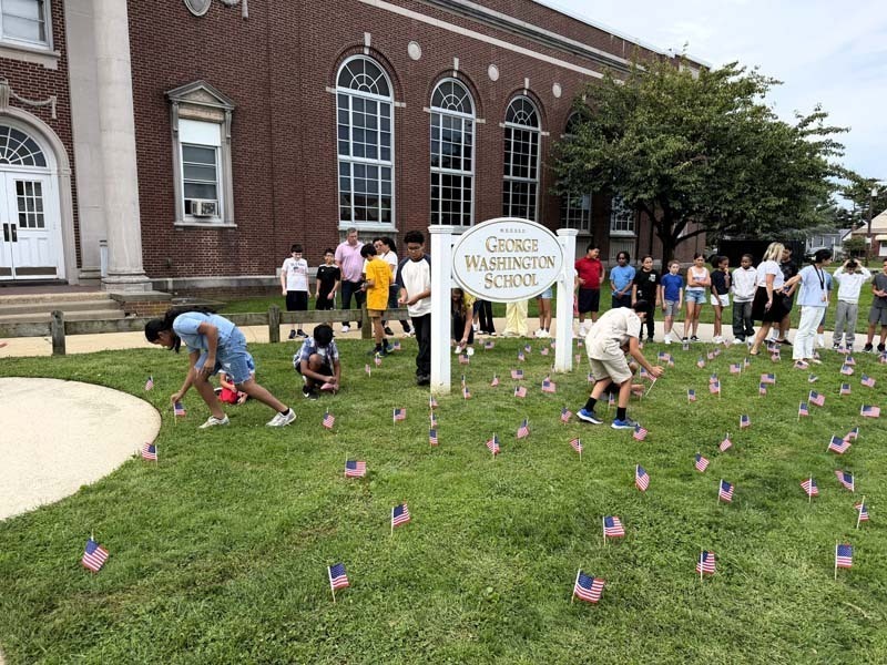 Students standing outside of school.
