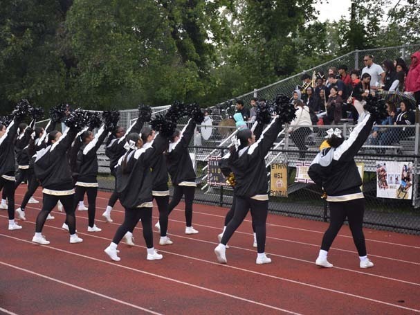 Student cheerleaders on field.