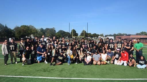 Before the Rams varsity football game, the secondary school honored its senior cheerleaders and players. 