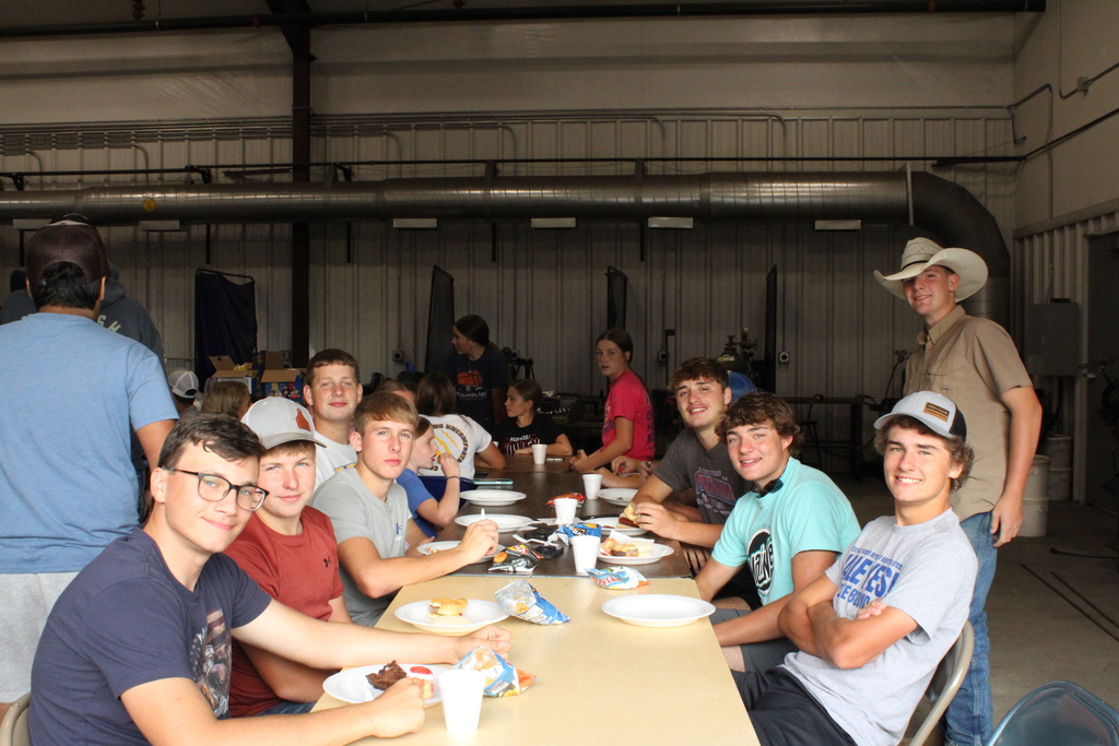 Members enjoy burgers together