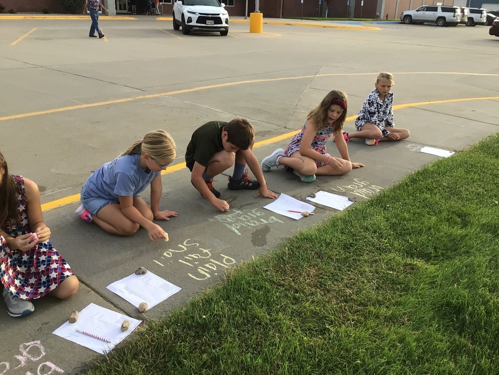 students practicing spelling words