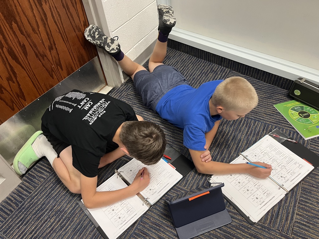 students logging in science journal