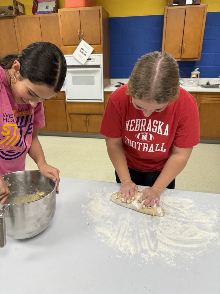 Spanish I kneading bread (pan de muerto)